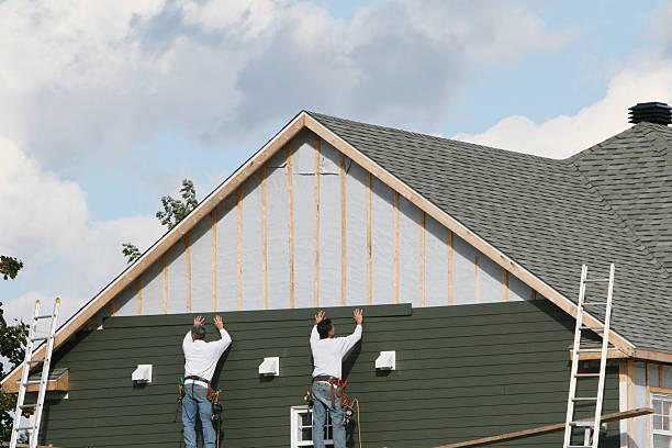 Professional Siding technician working in Greenville, SC